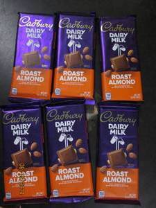 63.5 oz cadbury dairy milk roasted almond bars best by date of 42024