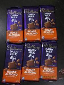6 3.5 oz cadbury dairy milk roasted almond bars best by date of 42024