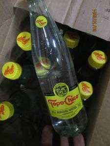 1215.5 oz bottles of topo chico mineral water