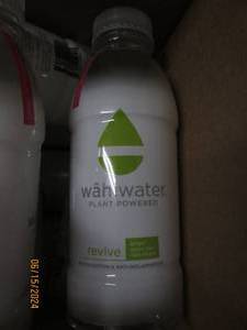 12 16.9 fl oz bottles of wahi water plant powered revive best by date of 12024