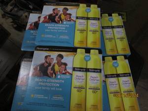 6 packages of 2 neutrogena beach defense sunscreen spray 60 spf 8.5 oz cans