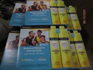 6 packages of 2 neutrogena beach defense sunscreen spray 60 spf 8.5 oz cans