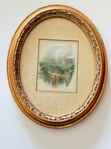 lot 44 image: Pair of Vintage Oval Framed Hand Colored Prints
