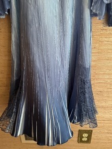 lot 108 image: Elegant Dress and Sweater Set by Komarov