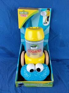 lot 15 image: New Sesame Street Cookie Monster Vacuum