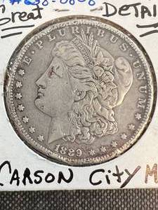 lot 01 image: 1889-CC US MORGAN SILVER DOLLAR