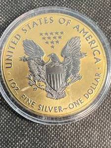 lot 15 image: 2019 AMERICAN SILVER EAGLE 1 TROY OZ .999 FINE SILVER GOLD PLATED IN AIRTITE