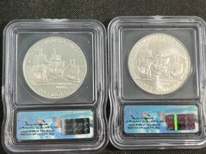 lot 34 image: 2 COIN SET FOUNDING OF JAMESTOWN SILVER DOLLARS ICG MS70 AND PF70