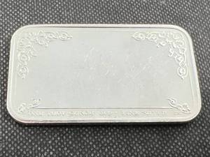 lot 38 image: 1 TROY OZ .999 FINE SILVER 1985 MERRY CHRISTMAS BAR