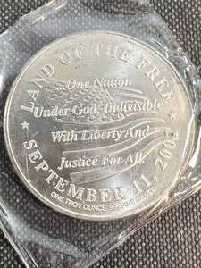 lot 62 image: 1 TROY OZ .999 FINE SILVER 911 MEMORIAL ROUND