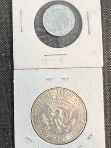 lot 66 image: 1964-D US KENNEDY HALF DOLLAR AND 110TH TROY OZ .999 FINE SILVER ROUND