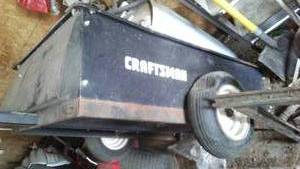 lot 674 image: Craftsman garden cart, 10 cubic foot plus tailgate.
