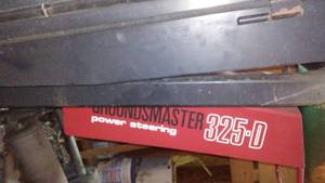 lot 683 image: Toro riding mower, Groundsmaster 325-D with Cozy Cab full glass. Nice condition no key to test.