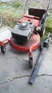 lot 805 image: Ariens Commercial grade Mower and plug-in blower. mower pulls hard.