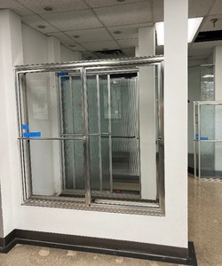 Alumax tub and shower slider with clear glass doors and a single towel bar