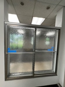 Alumax Tub & Shower Slider features obscure glass doors and inner and outer towel bars. Measures approx 60 W X 59 H