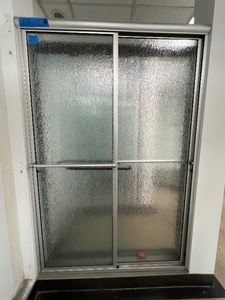 Shower Slider features an Euro Style rounded header with obscure glass doors, inner and outer towel bars... approx 48 W X 71 H