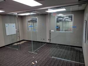 Glass Wall Office, T-Shaped configuration creates 2 modular office spaces. Overall measurement is 171 L X 61 D X 711 H