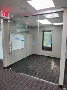 Glass Wall with a sliding, lockable door, overall measurement is 83 L X  711 H. All glass is 12 thick.
