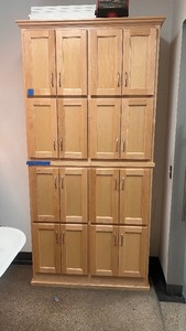 Storage TowerCabinets with 16 doors. Measures approx. 43 W X 16 D X 89.5 H