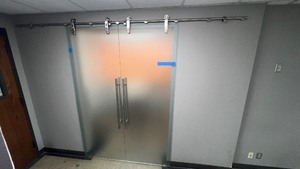 Barn style sliding glass doors with 125 track trolley