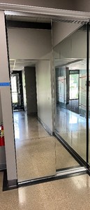 Mirrored Sliding Closet Doors with header and footer. Overall 46.75 W X 96.5 H