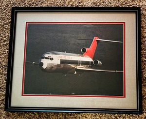 lot 124 image: Four Framed Northwest Orient Plane Pictures