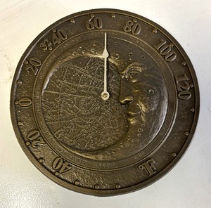 lot 406 image: Whimsical Moon and Sun Metal Clock and Thermometer