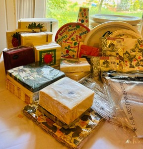 lot 253 image: One Stop Party Central Included with Paper Plates, Napkins, Cups and More