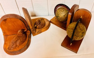 lot 157 image: Two Pairs of  Bookends Wood Duck and Globes