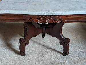 lot 23 image: Vintage Marble Topped Carved Wood Coffee Table