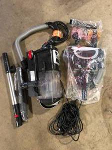 lot 16 image: Shark Navigator Lift-Away DLX Bagless Corded HEPA filter Upright Vacuum for Multi-Surface and Pet Hair in Black  Customer Returns See Pictures