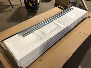 lot 3 image: Clopay Classic Steel Short Panel 8 ft x 7 ft Insulated 6.5 R-Value White Garage Door without Windows Missing Brackets and Hardware Customer Returns See Pictures