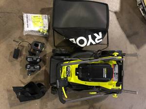 lot 4 image: RYOBI ONE HP 18V Brushless 16 in. Cordless Battery Walk Behind Push Lawn Mower with (2) 4.0 Ah Batteries and (1) Charger Customer Returns See Pictures