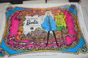 lot 7 image: Barbie case with barbies