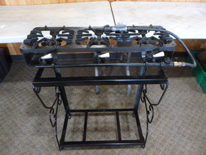 lot 97 image: Griswold 3 Burner Cast Iron Stove on Stand