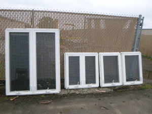 lot 130 image: 4 Crank-Out Vinyl Windows