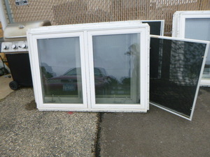 lot 132 image: 4 Crank-Out Vinyl Windows
