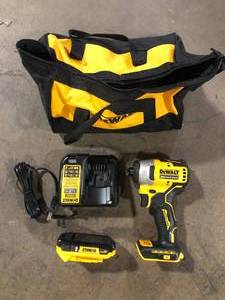 lot 7 image: DEWALT ATOMIC 20V Max Lithium-Ion Brushless Cordless Compact 14 in. Impact Driver Kit with 2.0Ah Battery, Charger and Bag  Customer Returns See Pictures