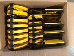 lot 33 image: Case of 4 DEWALT Medium and Large Trigger Clamp (4 Pack) Customer Returns See Pictures