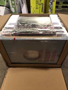 lot 34 image: Nexgrill 4-Burner Propane Gas Grill in Stainless Steel with Side Burner  Customer Returns See Pictures