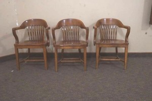 Three Dark Wood Armed Chairs