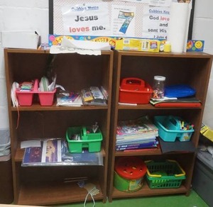 Two Shelves with kids contents