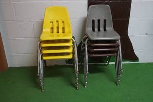 Eight BrownYellowgray plastic chairs