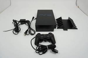 lot 38 image: PlayStation 2 System and Controller