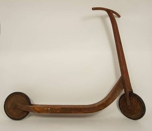 lot 45 image: Antique Toys...STEEL SCOOTER BY UNITED SPECIALTIES()
