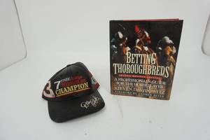 lot 97 image: NASCAR #3 Dale Earnhardt Winston Cup 7 Time Champion Leather Cap Hat And Magazine