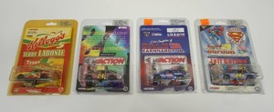 lot 121 image: NASCAR Action Racing Collectables 164 Diecast Jeff Gordon #24 Dupont Chromalusion, Superman Racing Jeff Gordon #24 Dupont, Dale Earnhardt Jr #31 Sikkens, Kelloggs Racing Terry Labonte #5 Cornflakes