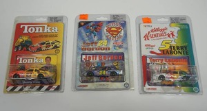 lot 122 image: NASCAR Action Racing Collectables 164 Diecast Superman Racing Jeff Gordon #24 Dupont, Kenny Irwin #27 Tonka, Kelloggs Racing Terry Labonte #5 K-Sentials