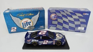 lot 152 image: Rusty Wallace #2 Miller Lite Harley-Davidson 1999 Ford Taurus Action Racing 124 NASCAR Diecast Car BANK...